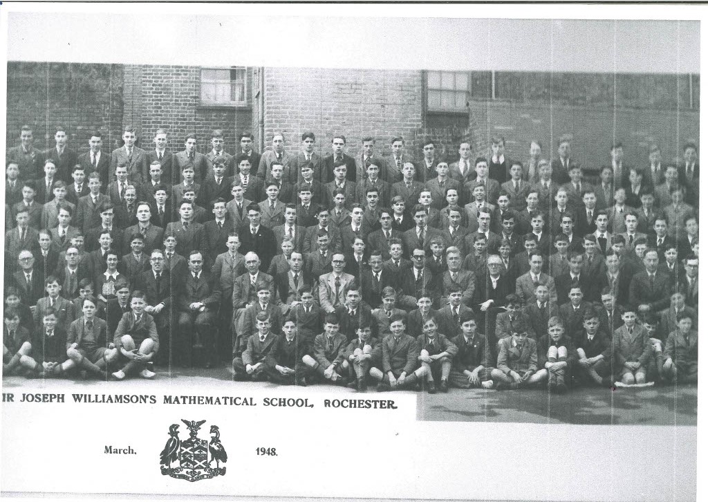 Photograph kindly donated by Michael Cleary: a third of the whole school 1948 showing the Headteacher, Mr Ken R Imeson and some staff many of whom were retired military personnel who served in WWII. Students listened to their stores in awe.